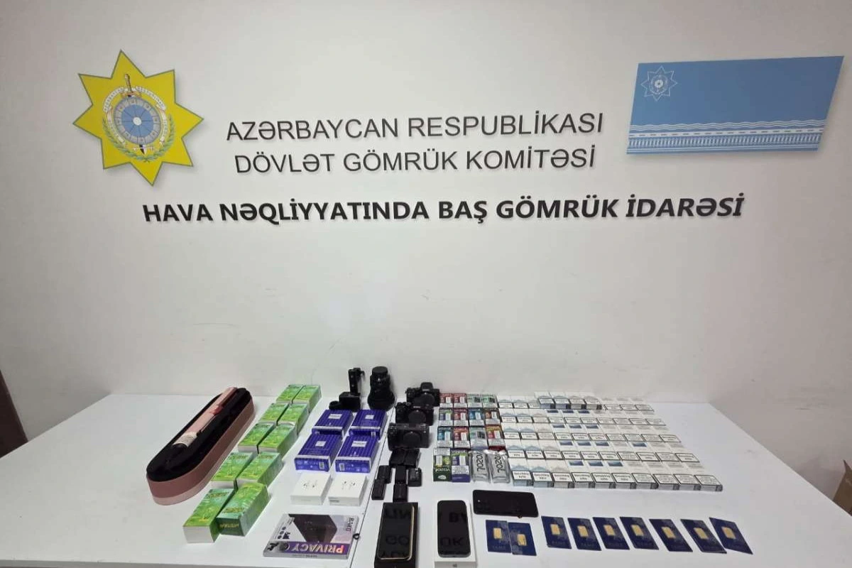 Mobil telefonda gizlədilmiş qızıl külçələr aşkarlanıb