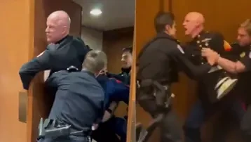 ABŞ Konqresində etiraz: keçmiş hərbçinin qolu sındı